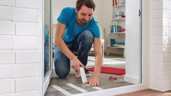 Preview: tesa Verlegeband rückstandsfrei entfernbar - 10 m x 50 mm, 55731-00011-11